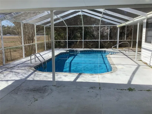 a view of a wooden deck with a bench