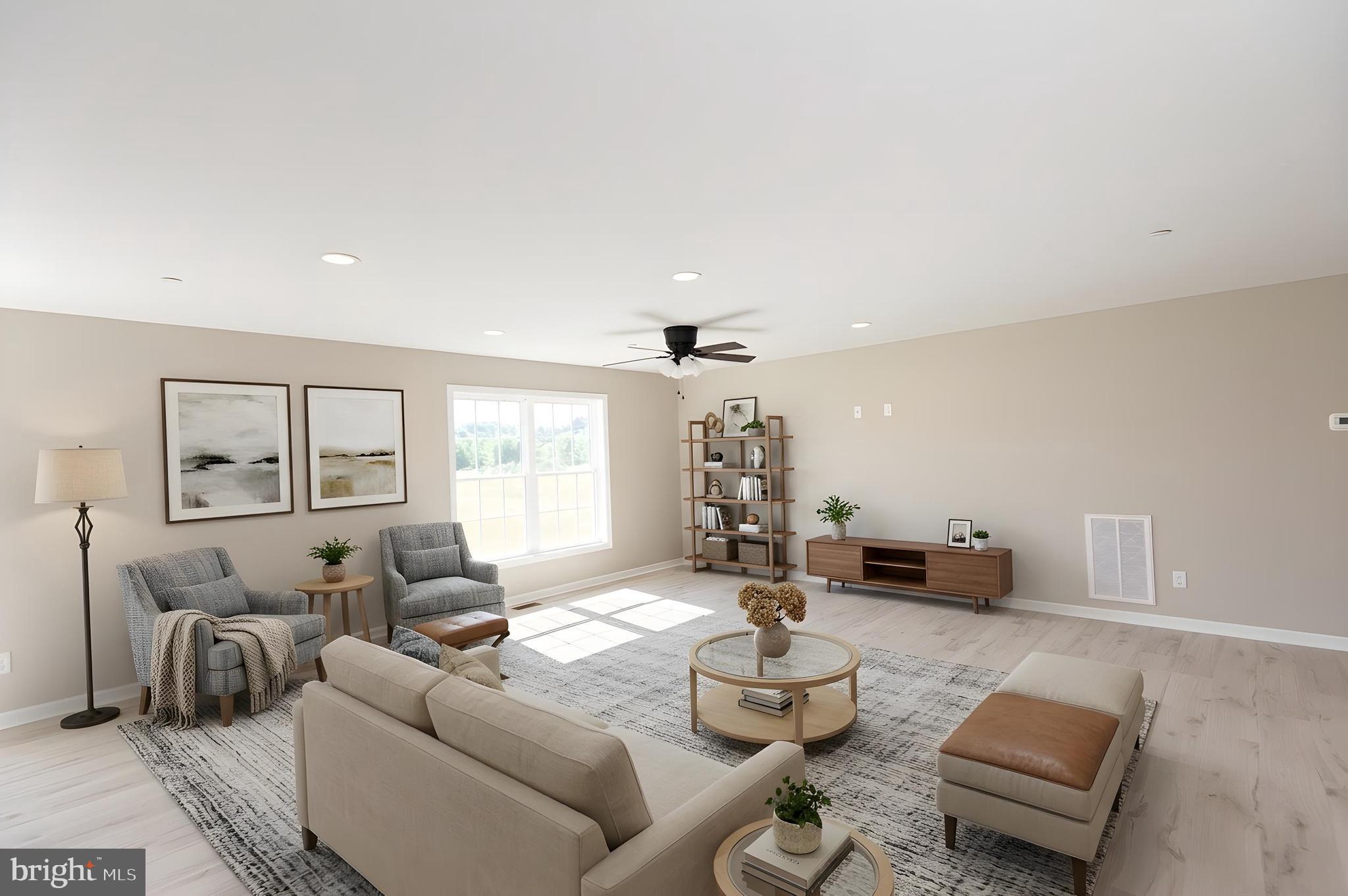 Wrights Rest Road Hurlock, MD 21643 - Photo 2 of 22 a living room with furniture and a large window