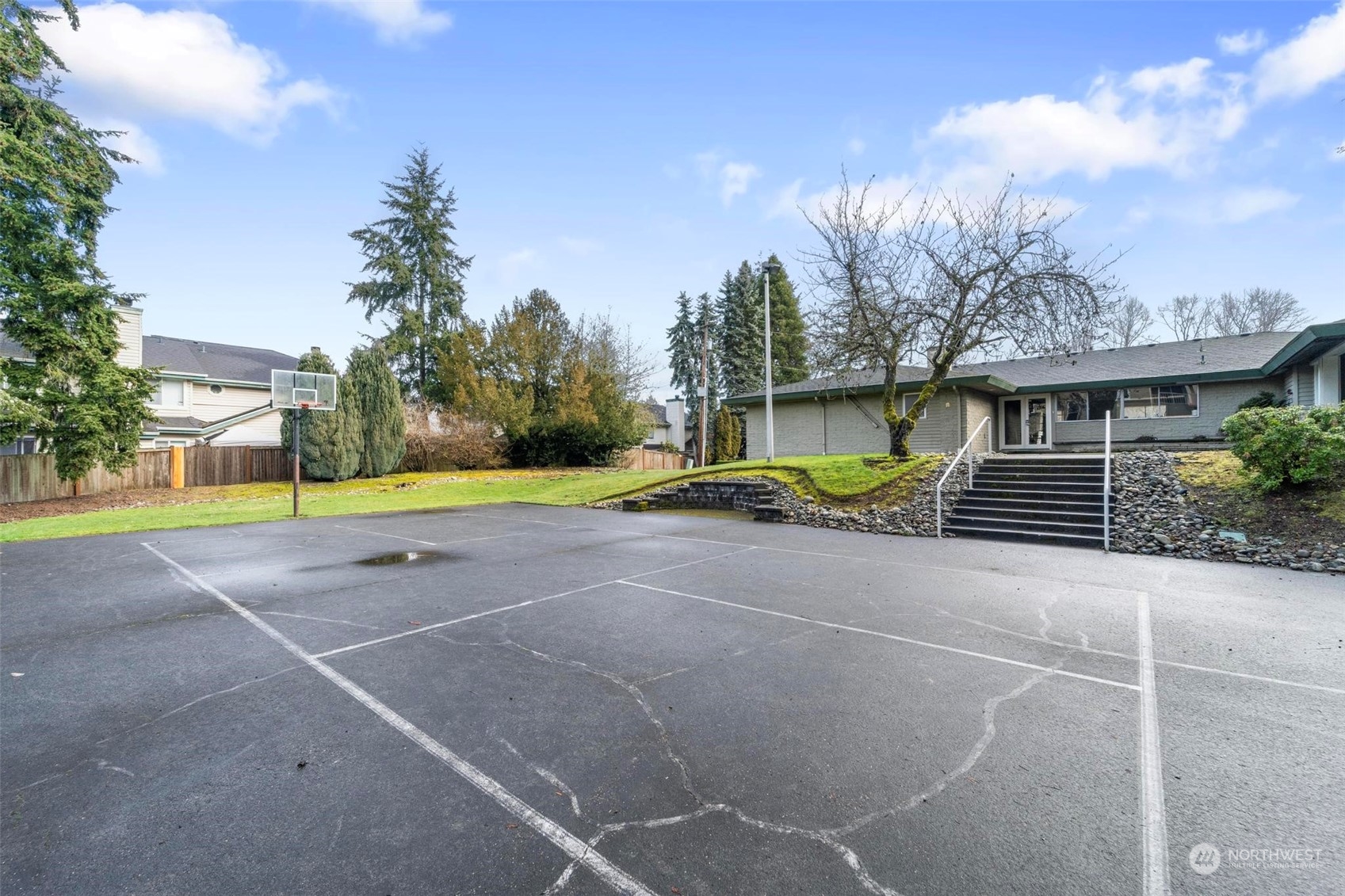 20328 Bothell Everett Highway, Unit B101 Bothell, WA 98012 - Photo 24 of 25 a view of a house with basketball court