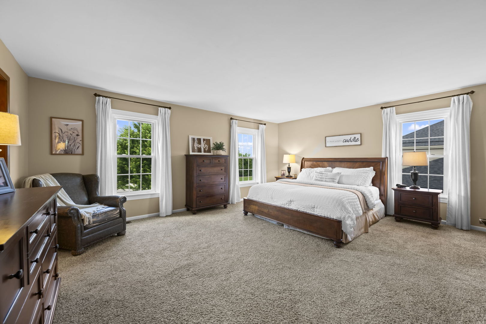 1565 Freeman Road Hoffman Estates, IL 60192 - Photo 29 of 46 a bedroom with a bed and a couch