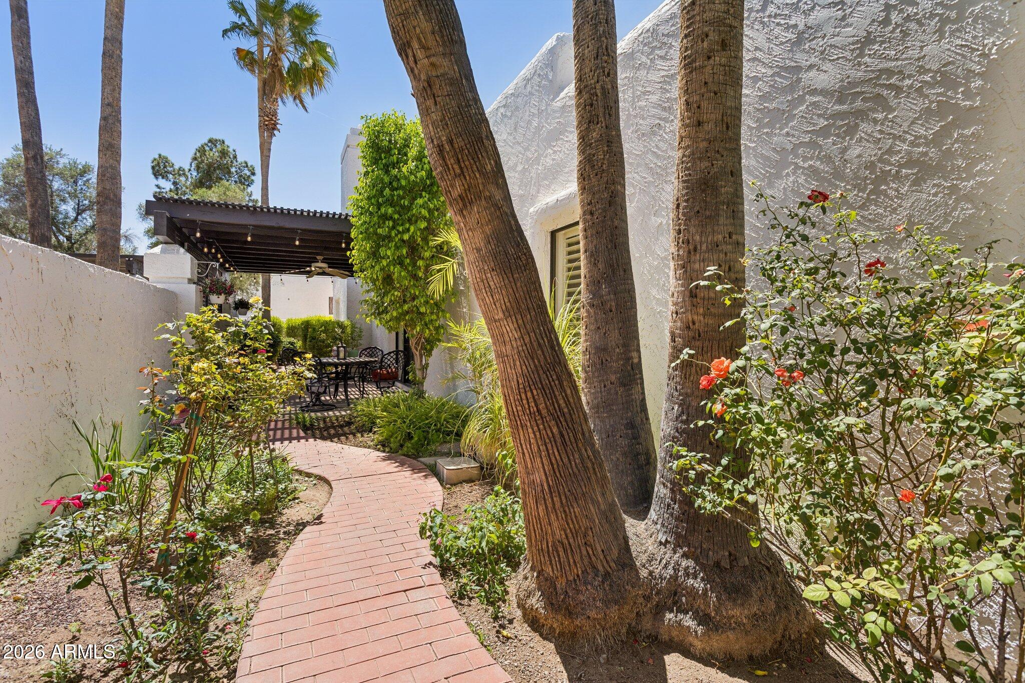 4438 East Camelback Road, Unit 149 Phoenix, AZ 85018 - Photo 39 of 52 Entering the wrap around Patios