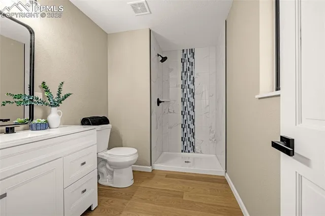 an empty room with a empty space and windows