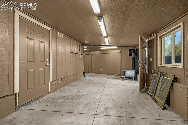 a room with furniture and a flat screen tv