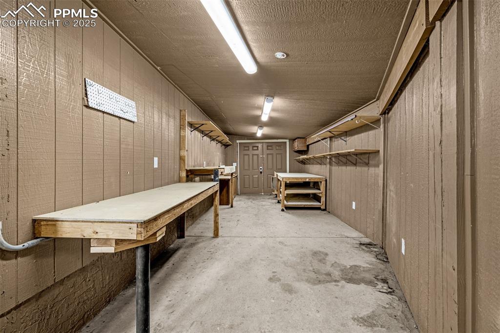 23 Newport Circle Colorado Springs, CO 80906 - Photo 32 of 49 a room with furniture and a flat screen tv