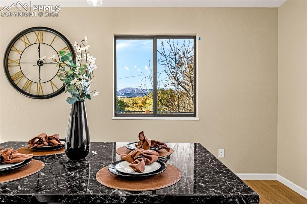 23 Newport Circle Colorado Springs, CO 80906 - Photo 9 of 49 a view of a workspace with furniture and a window