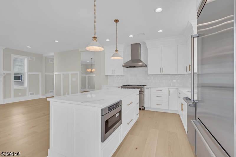 44 Brooklake Road Madison, NJ 07940 - Photo 11 of 44 a kitchen with a sink stove and wooden floor