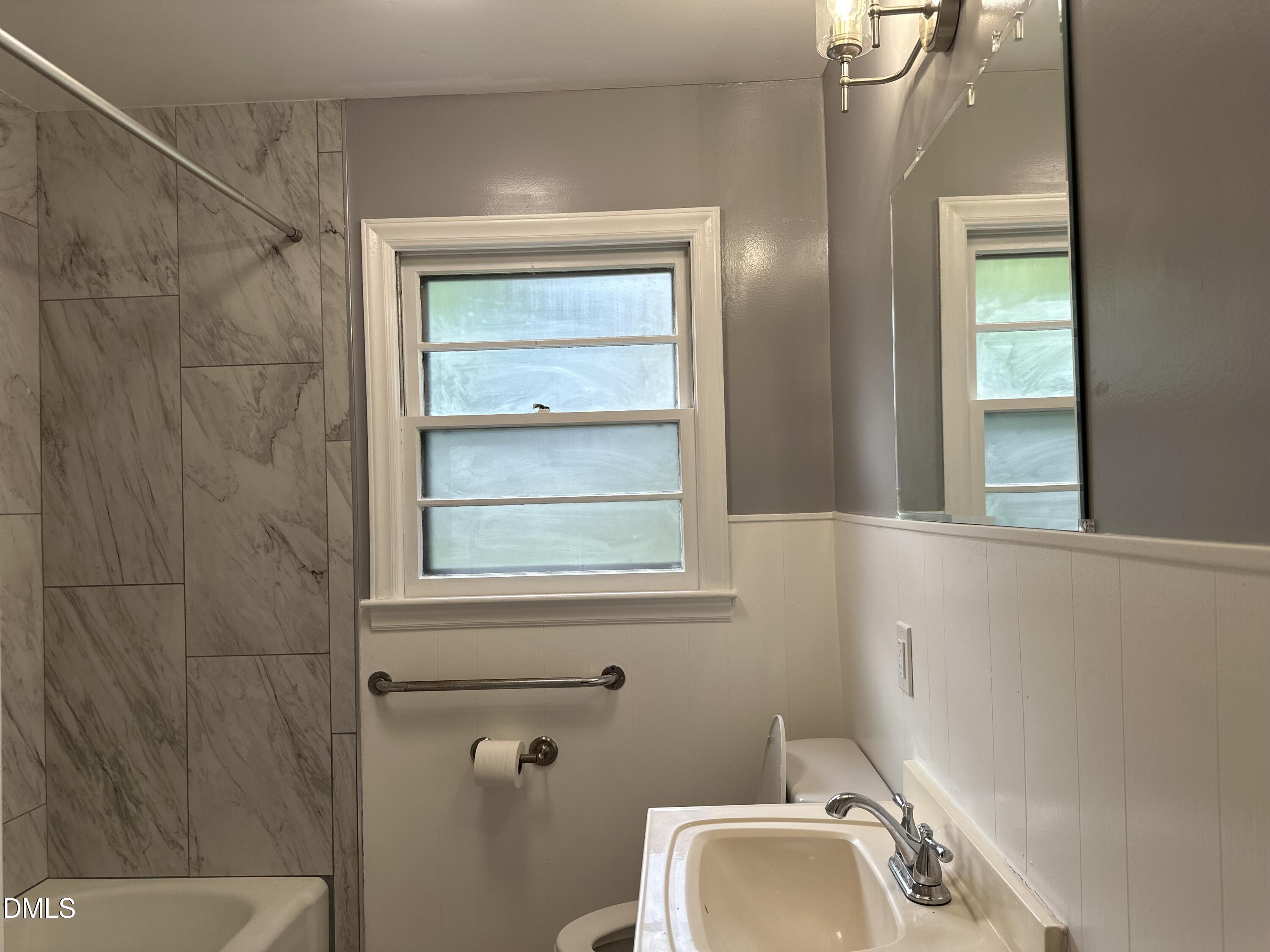 710 North Wilba Road Mebane, NC 27302 - Photo 6 of 7 a bathroom with a sink a toilet and shower