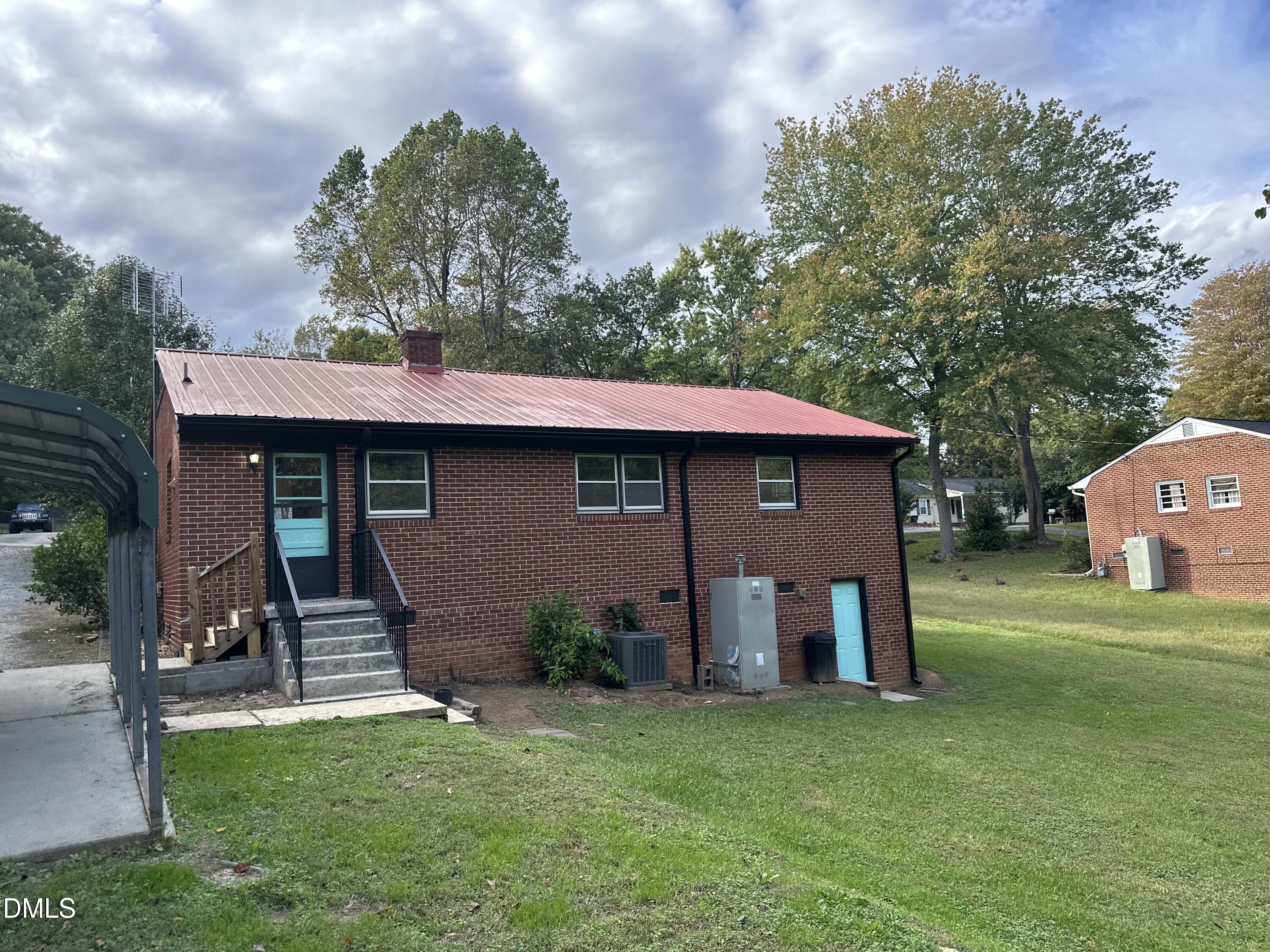 710 North Wilba Road Mebane, NC 27302 - Photo 7 of 7 a view of a house with a yard