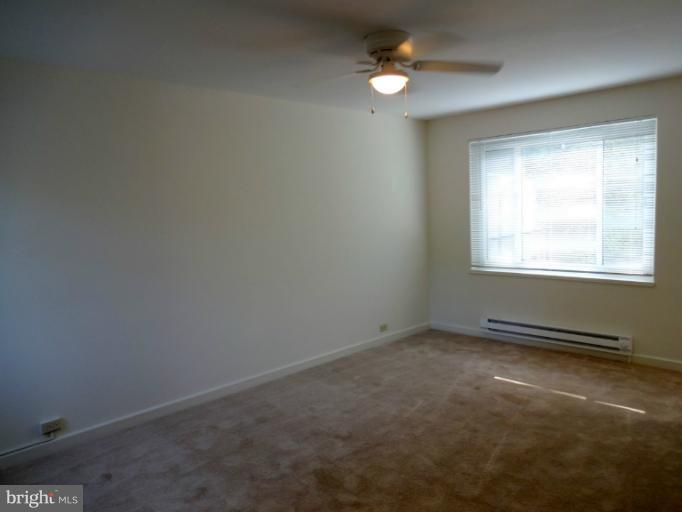 47 Ridge Road, Unit C Greenbelt, MD 20770 - Photo 3 of 30 Living Room / View from Front Door