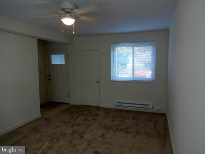 47 Ridge Road, Unit C Greenbelt, MD 20770 - Photo 4 of 30 Living Room / View from Back Window and Door