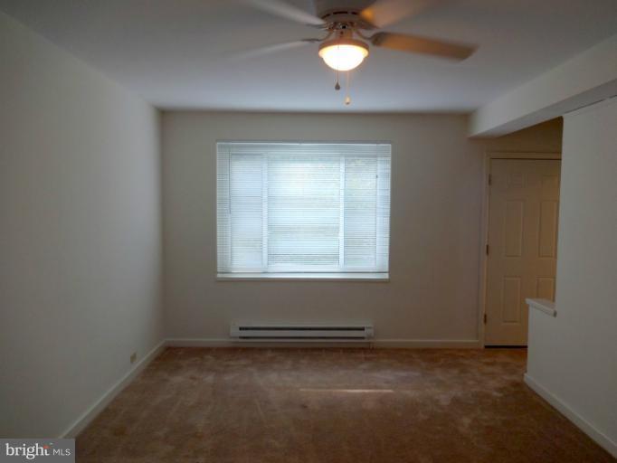 47 Ridge Road, Unit C Greenbelt, MD 20770 - Photo 5 of 30 Living Room / View from Front Window