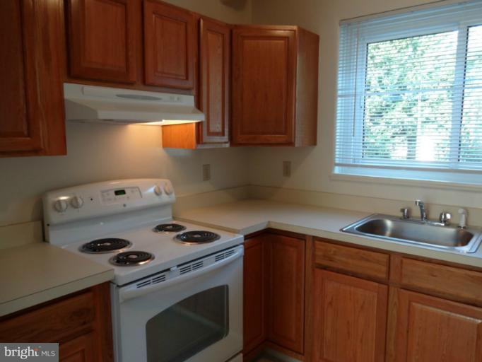 47 Ridge Road, Unit C Greenbelt, MD 20770 - Photo 8 of 30 Kitchen / View from the Dining Room
