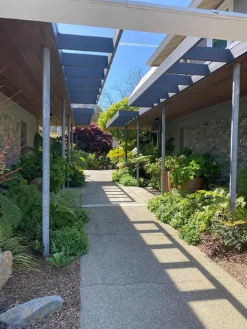 a view of a building with a garden