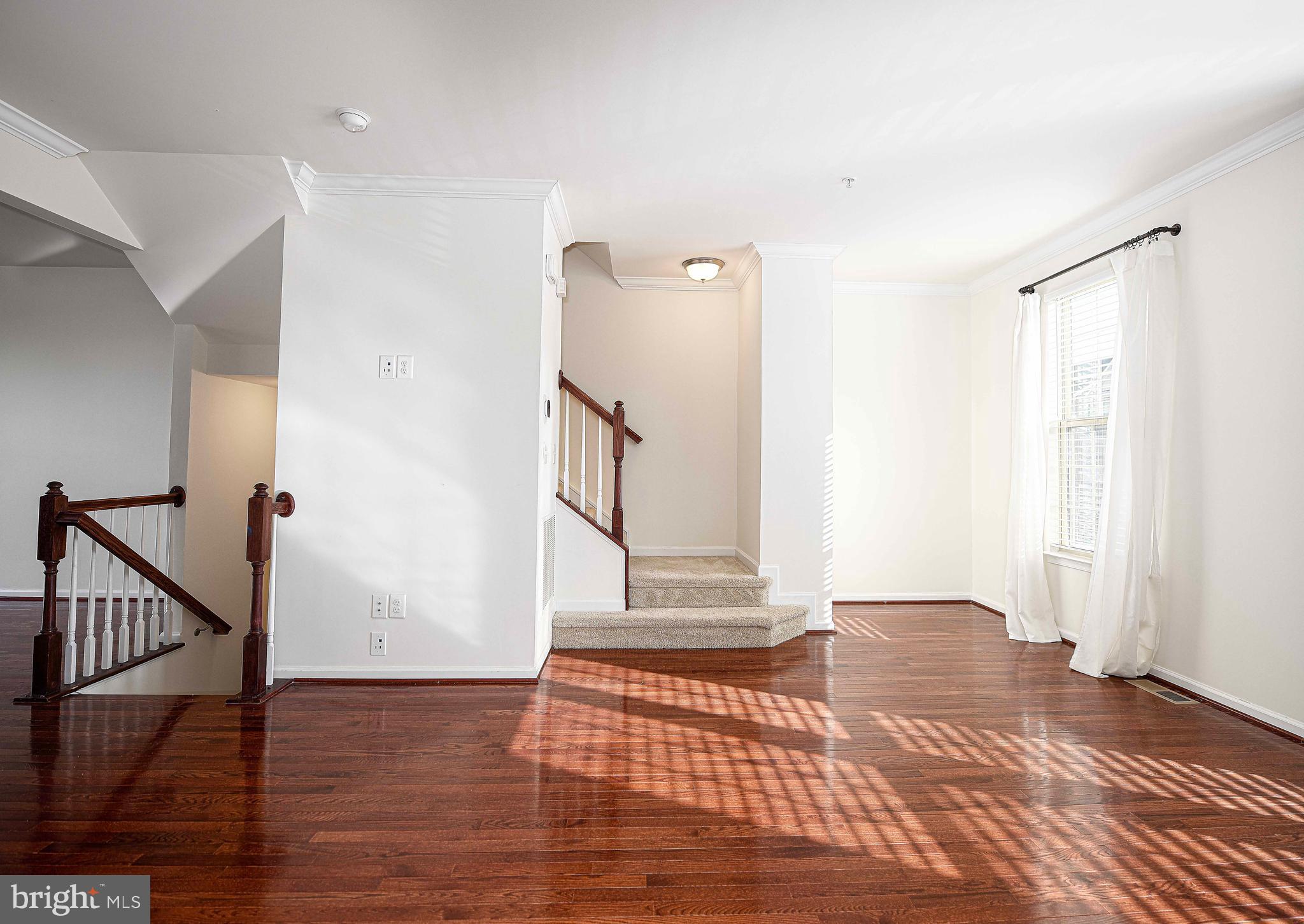 1032 Ramble Run Road Baltimore, MD 21220 - Photo 16 of 46 a view of an entryway with wooden floor
