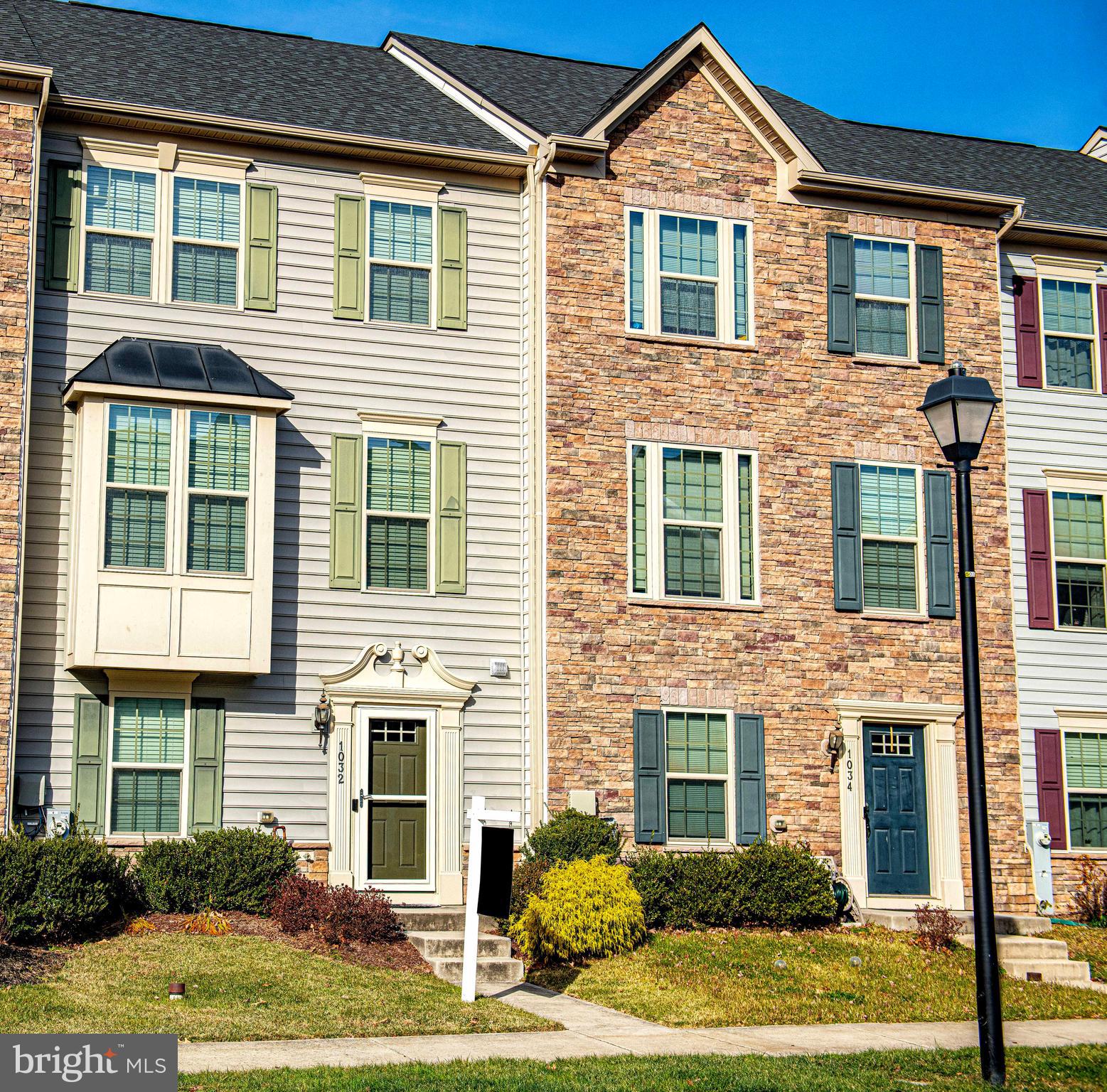 1032 Ramble Run Road Baltimore, MD 21220 - Photo 2 of 46 a front view of a house with a garden