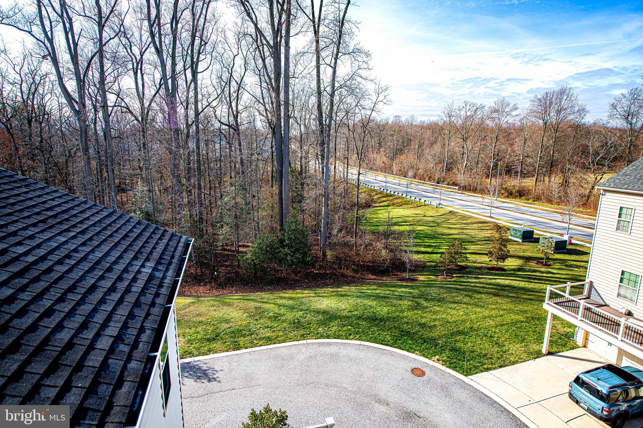 1032 Ramble Run Road Baltimore, MD 21220 - Photo 32 of 46 a view of a backyard with a garden
