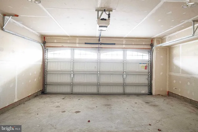 a view of a backyard with a garden