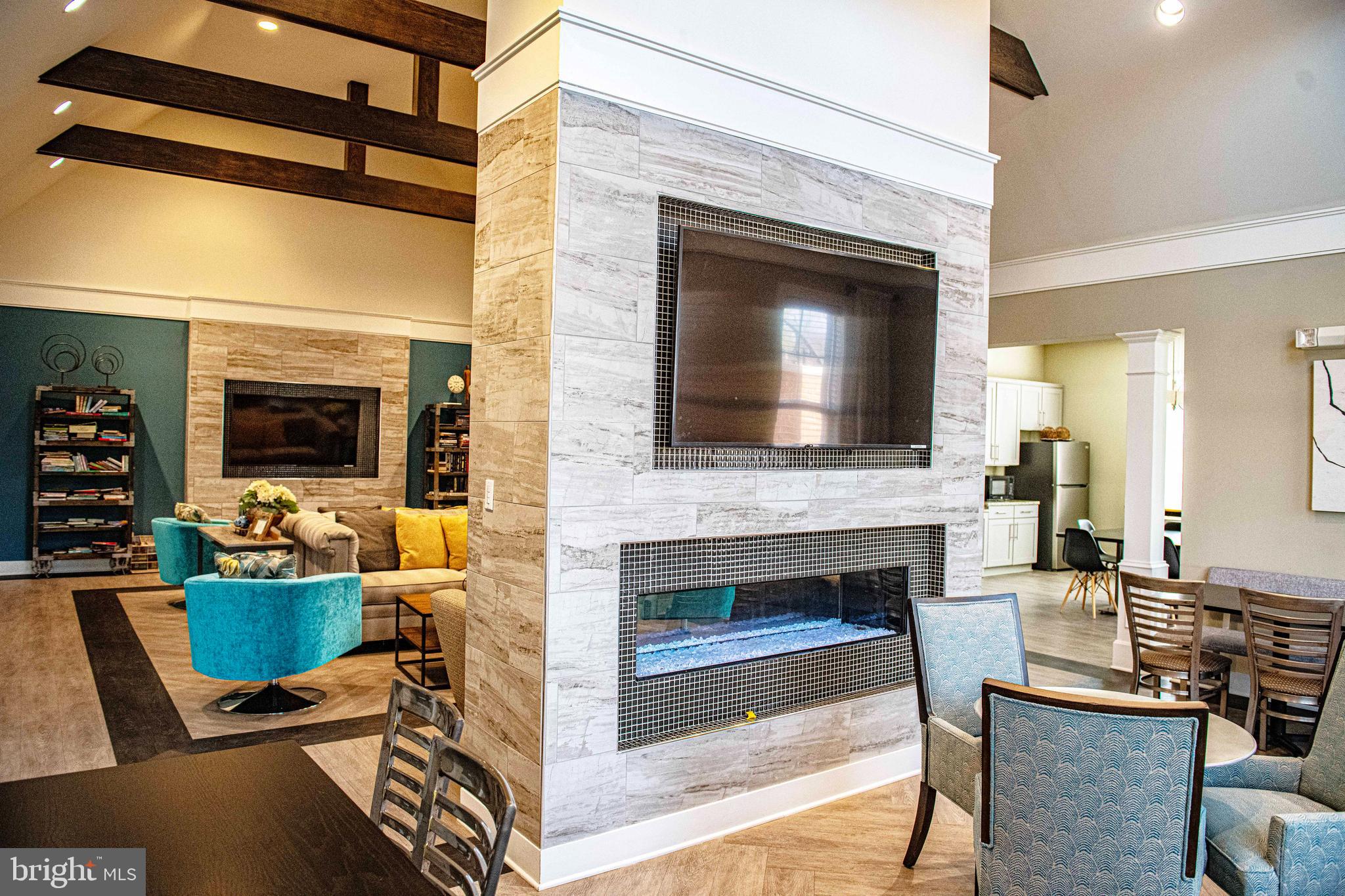 1032 Ramble Run Road Baltimore, MD 21220 - Photo 39 of 46 a living room with furniture fireplace and flat screen tv