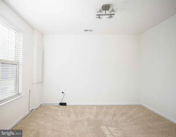 a view of a small space with a window