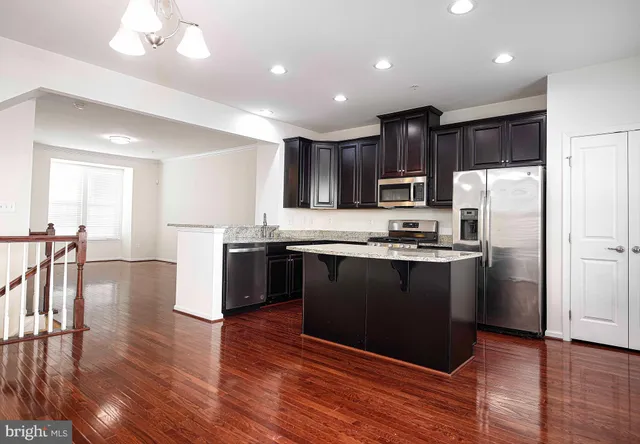 a sign board with a house