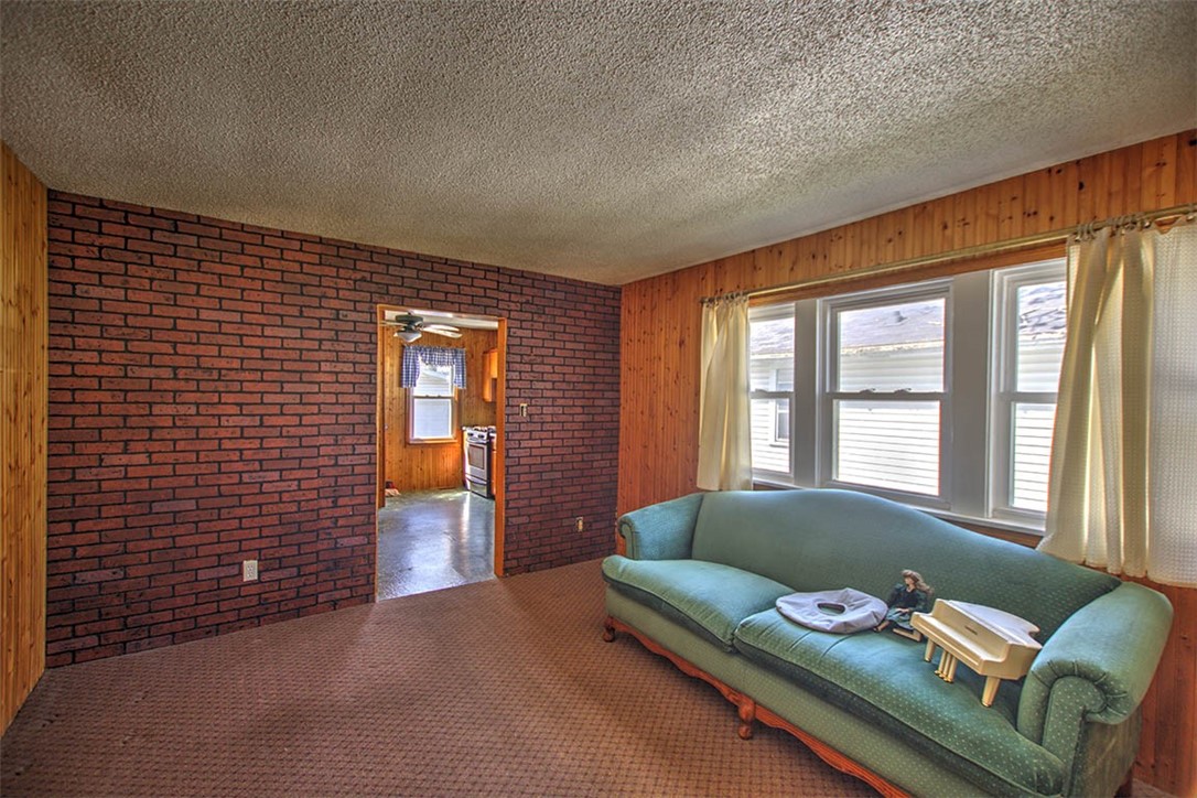 2549 East Main Street Decatur, IL 62521 - Photo 3 of 12 a living room with furniture and windows