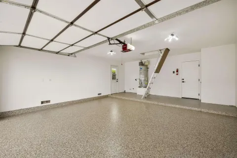 a view of a livingroom with a ceiling fan and window