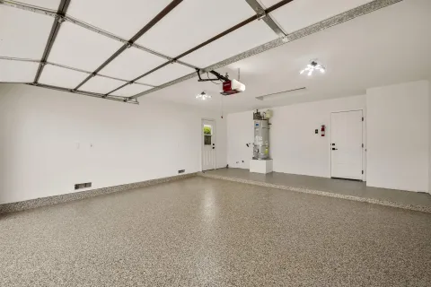 an aerial view of multiple houses with yard