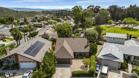 an aerial view of residential house with outdoor space