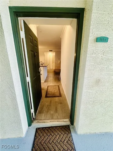 a kitchen with granite countertop a sink and a stove top oven