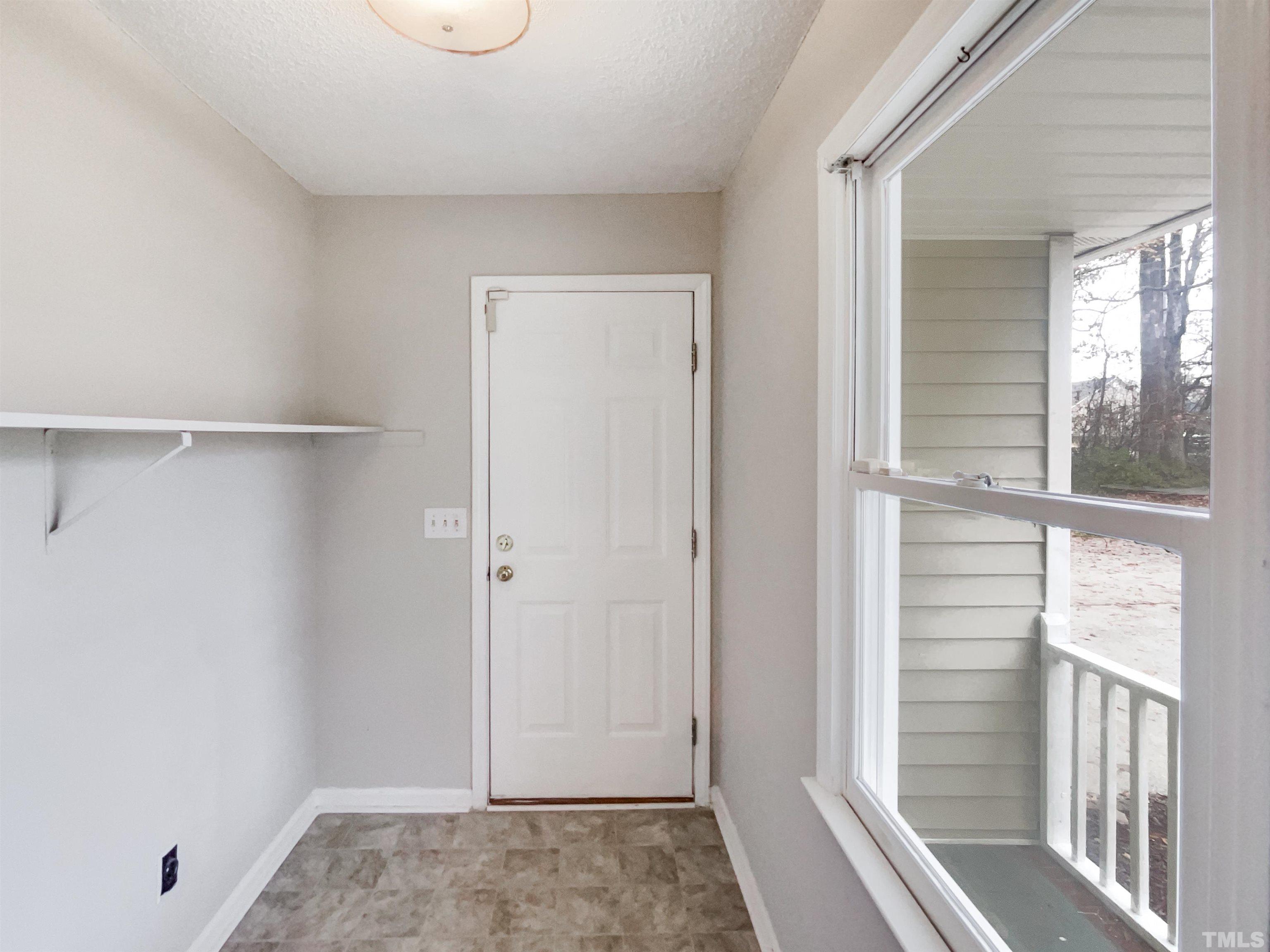 1459 Atkins Road Fuquay-Varina, NC 27526 - Photo 4 of 21 a view of walk in closet with window