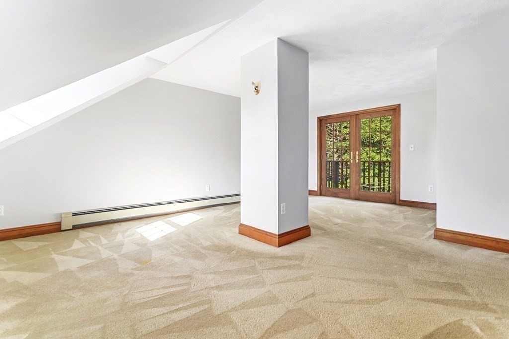 82 Spring Street Stoneham, MA 02180 - Photo 18 of 34 an empty room with windows