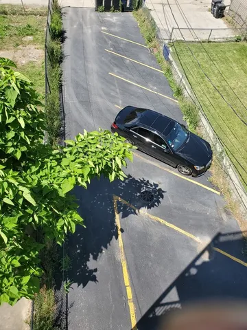 a view of a backyard of the house