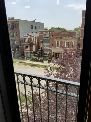 a view of a city from a balcony