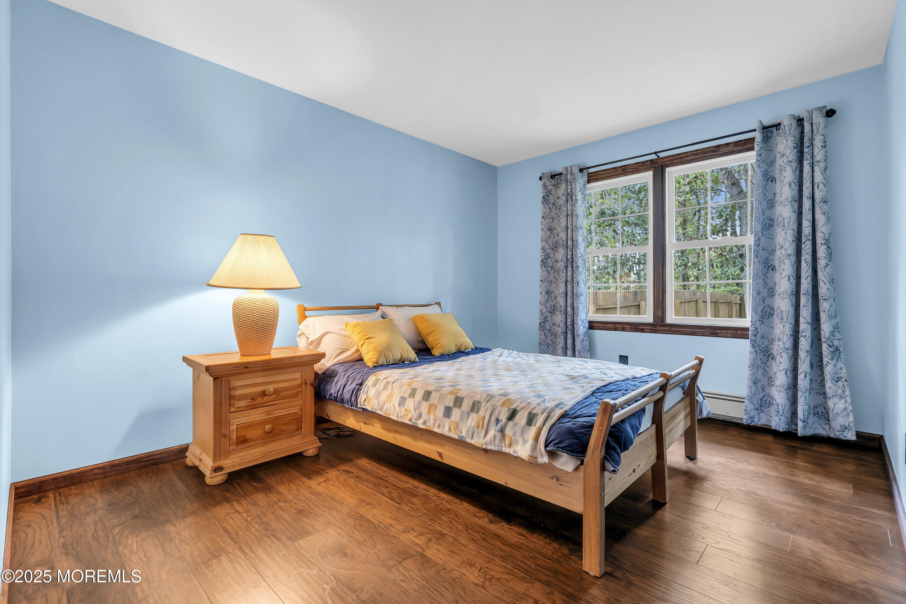 1759 Burrsville Road Brick, NJ 08724 - Photo 13 of 18 a bedroom with a bed lamp and a window