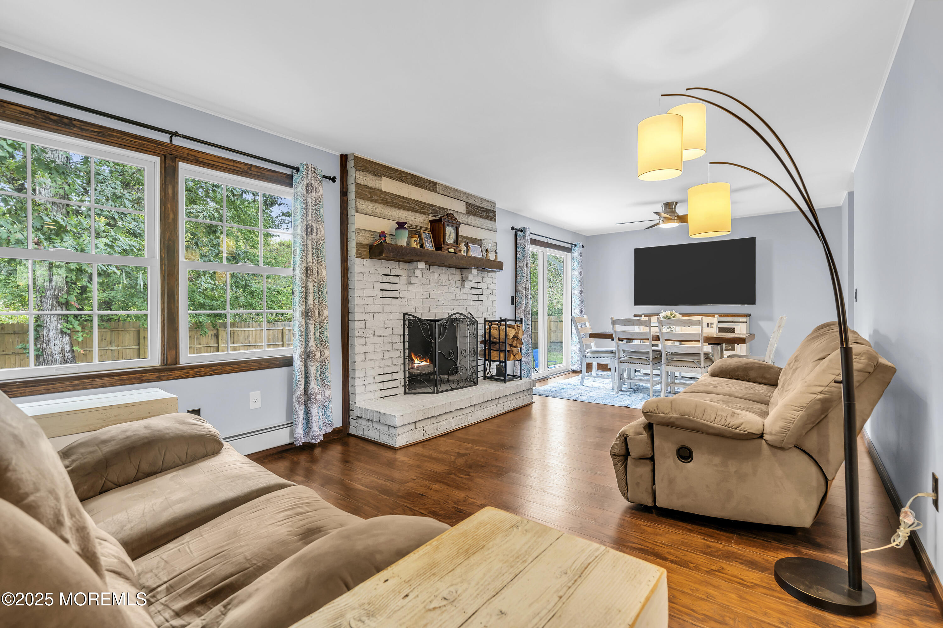 1759 Burrsville Road Brick, NJ 08724 - Photo 6 of 18 a living room with furniture and a fireplace
