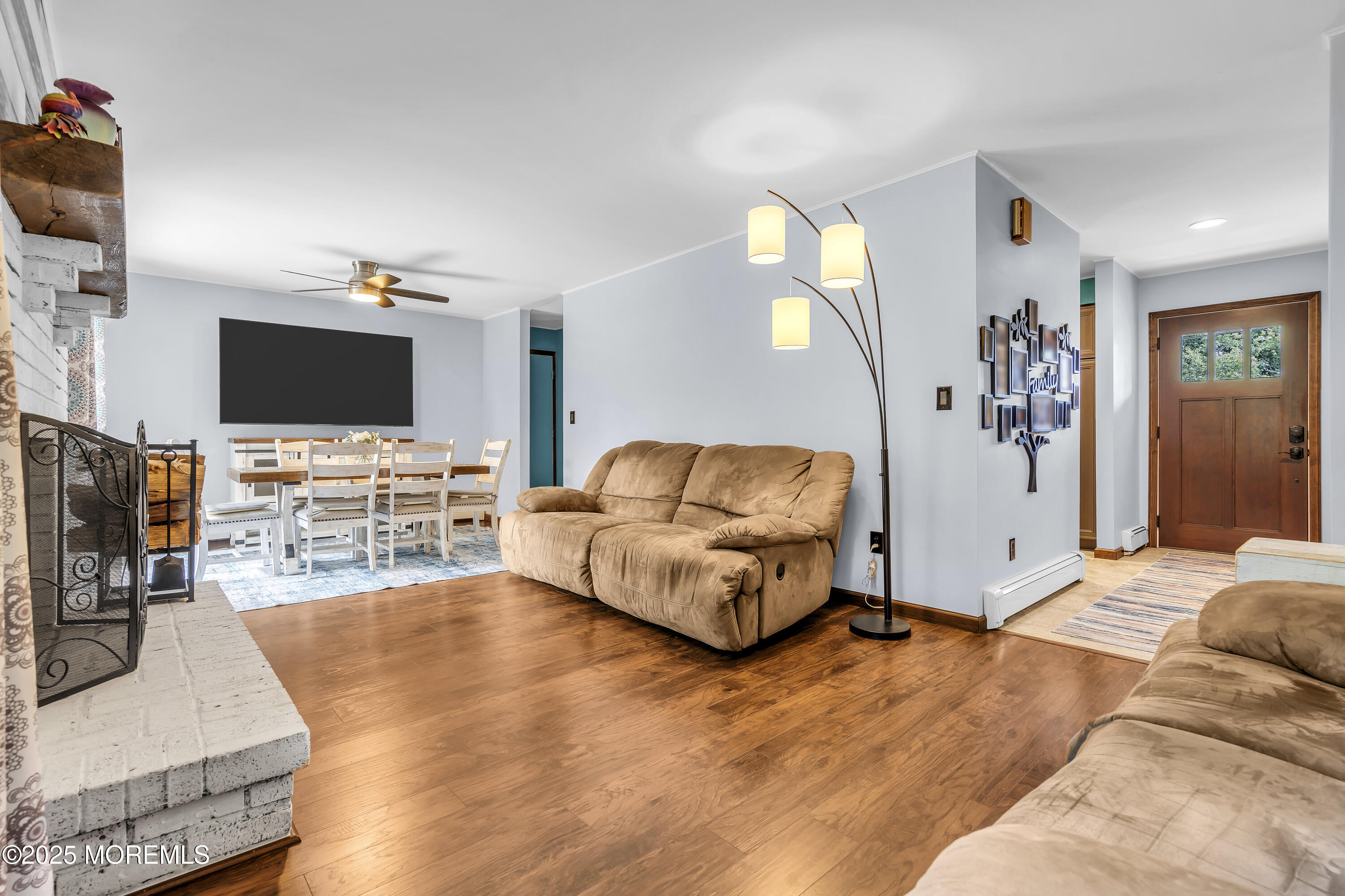 1759 Burrsville Road Brick, NJ 08724 - Photo 7 of 18 a living room with furniture and a flat screen tv