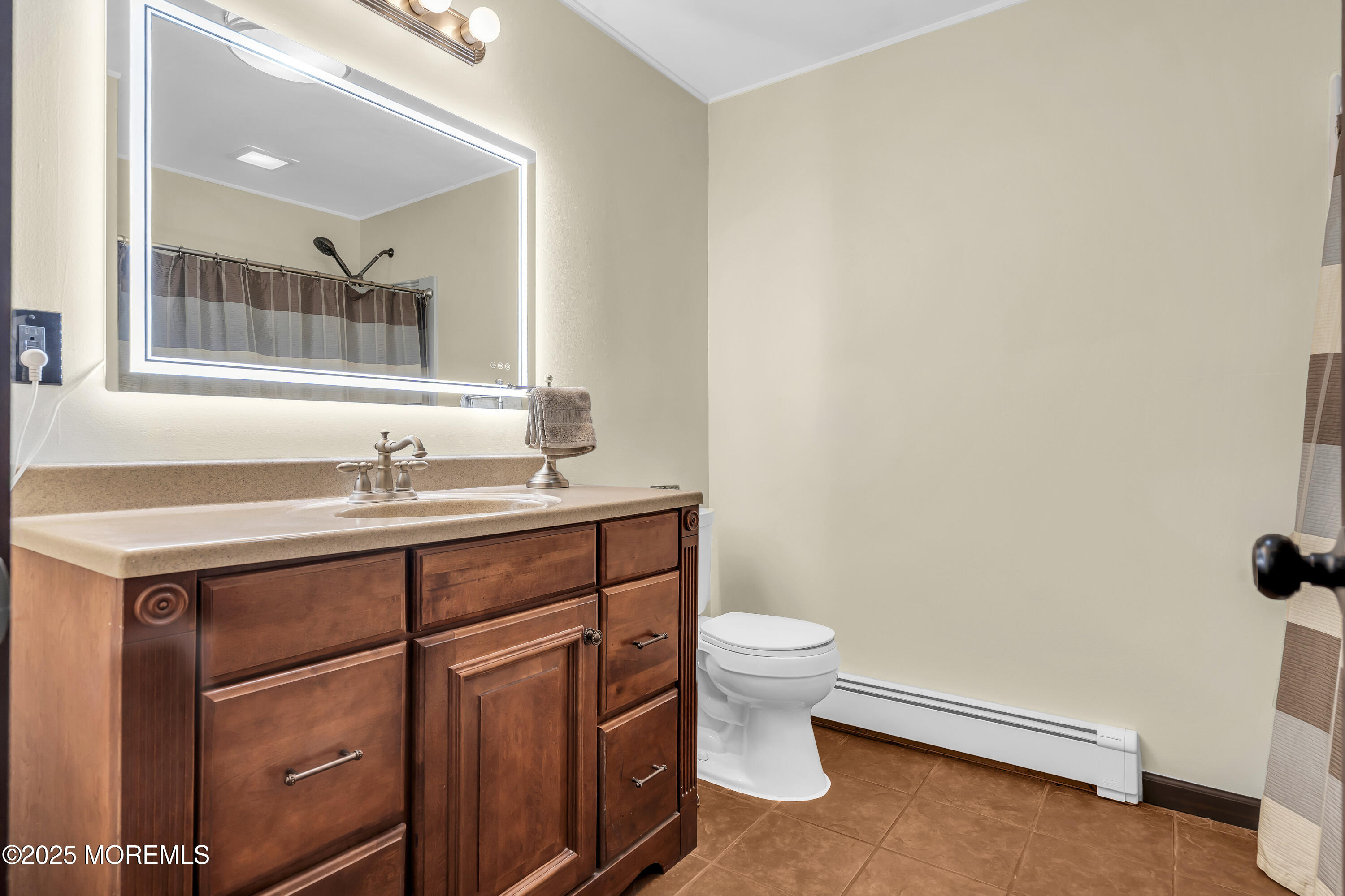 1759 Burrsville Road Brick, NJ 08724 - Photo 9 of 18 a bathroom with a sink toilet and mirror