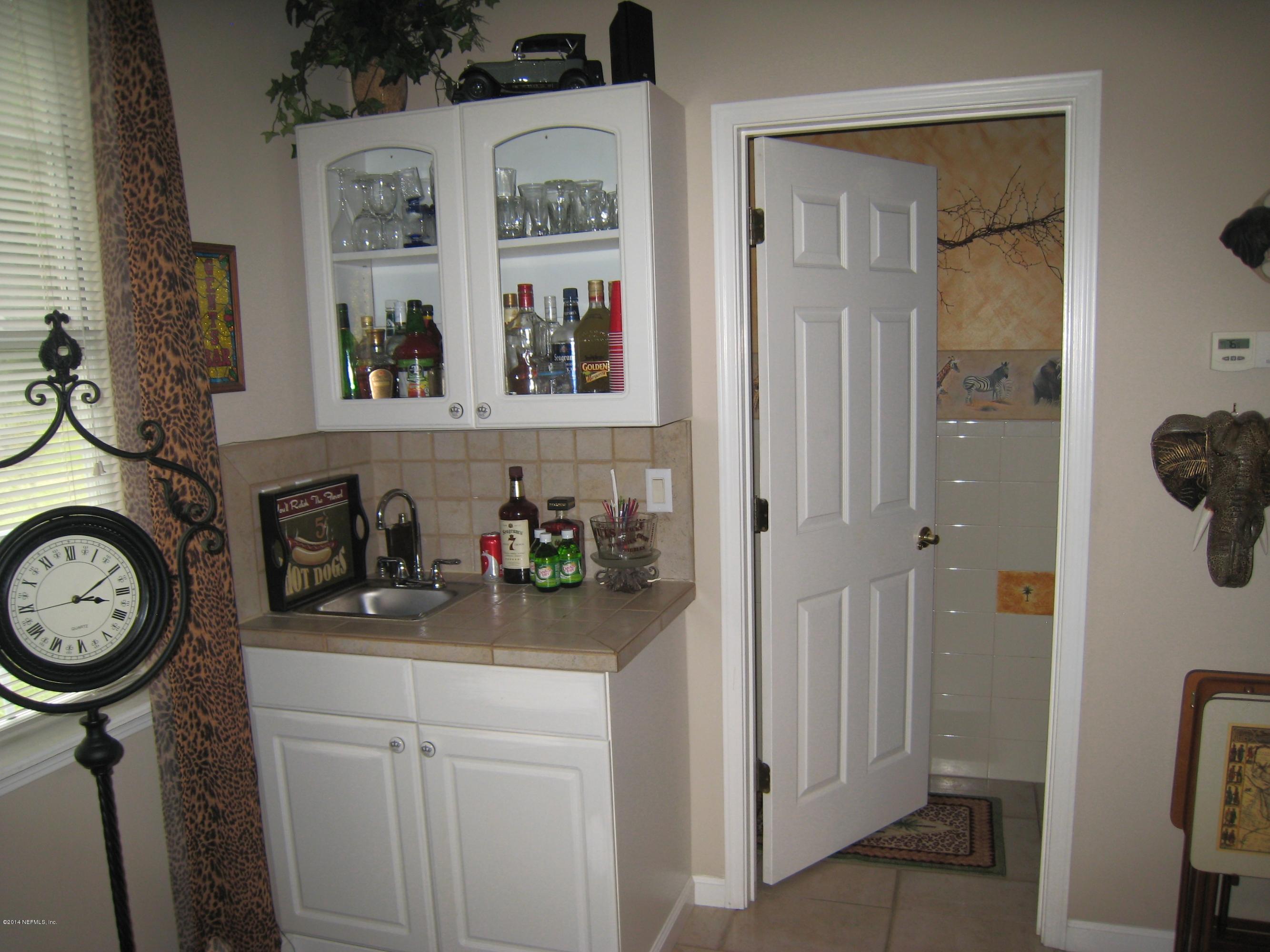 11636 Mandarin Road Jacksonville, FL 32223 - Photo 12 of 41 a view of storage and utility room