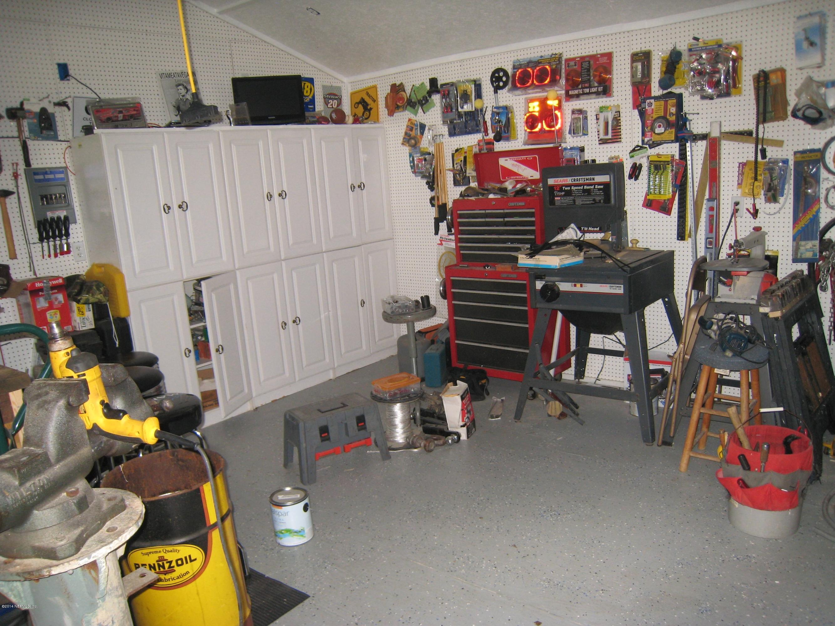 11636 Mandarin Road Jacksonville, FL 32223 - Photo 41 of 41 a view of a room with gym equipment