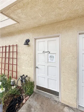 an aerial view of a house with a garden
