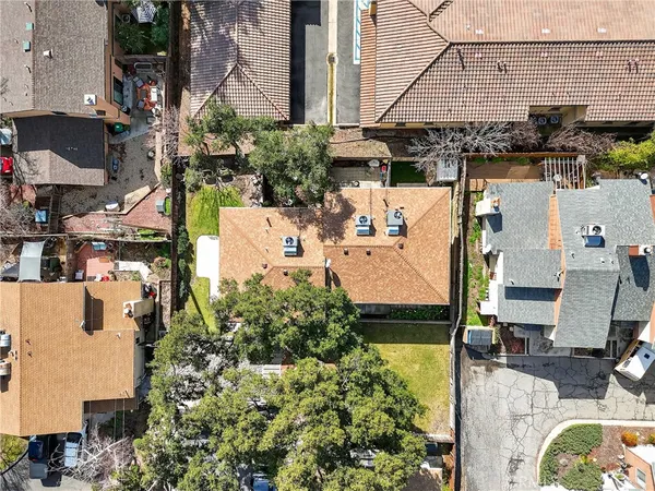 an aerial view of a city with lots of residential buildings
