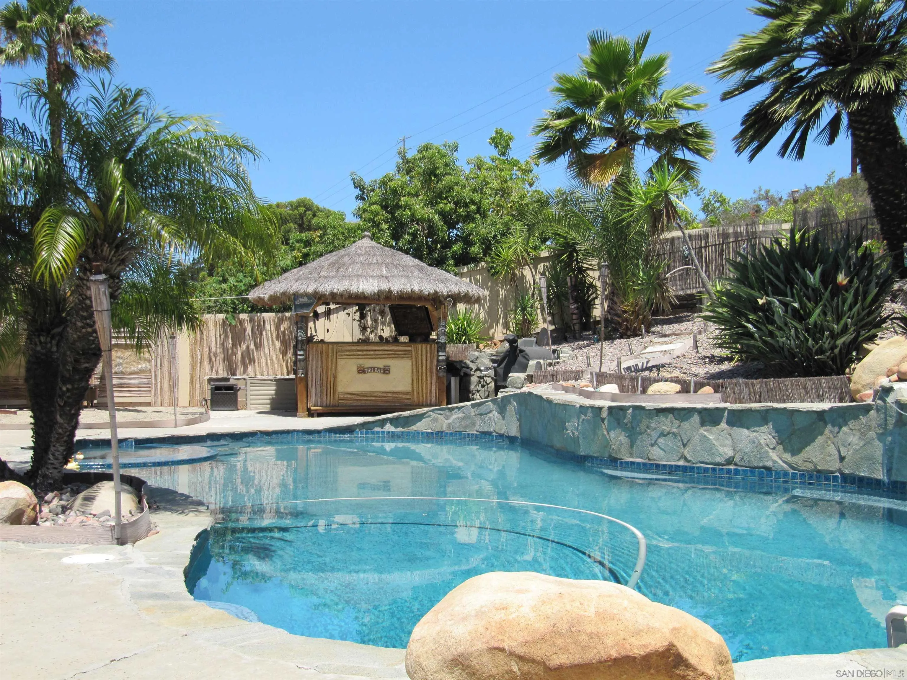 13236 Poway Hills Drive Poway, CA 92064 - Photo 13 of 19 a view of a house with a swimming pool