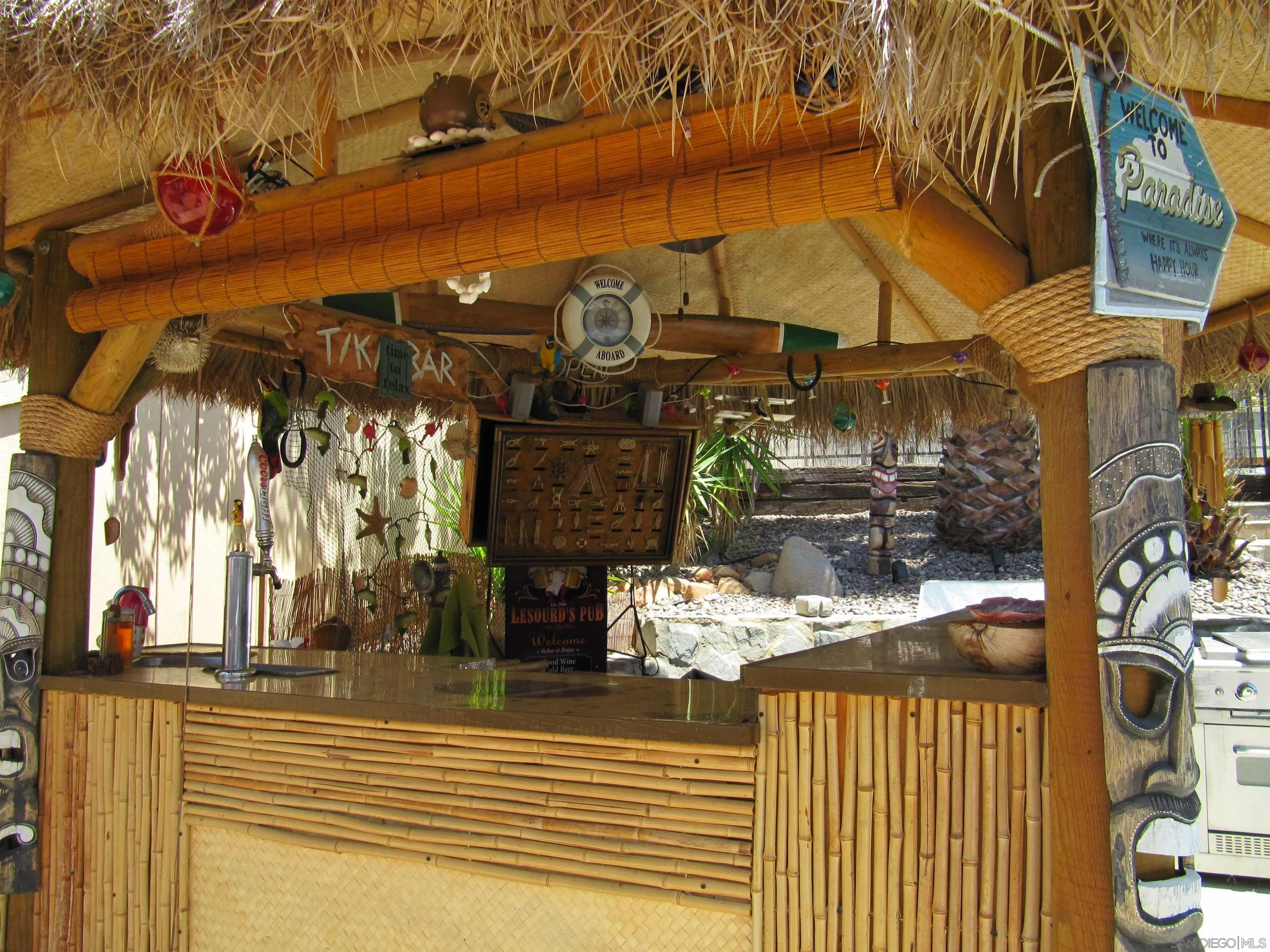 13236 Poway Hills Drive Poway, CA 92064 - Photo 15 of 19 a view of a brick house with many windows