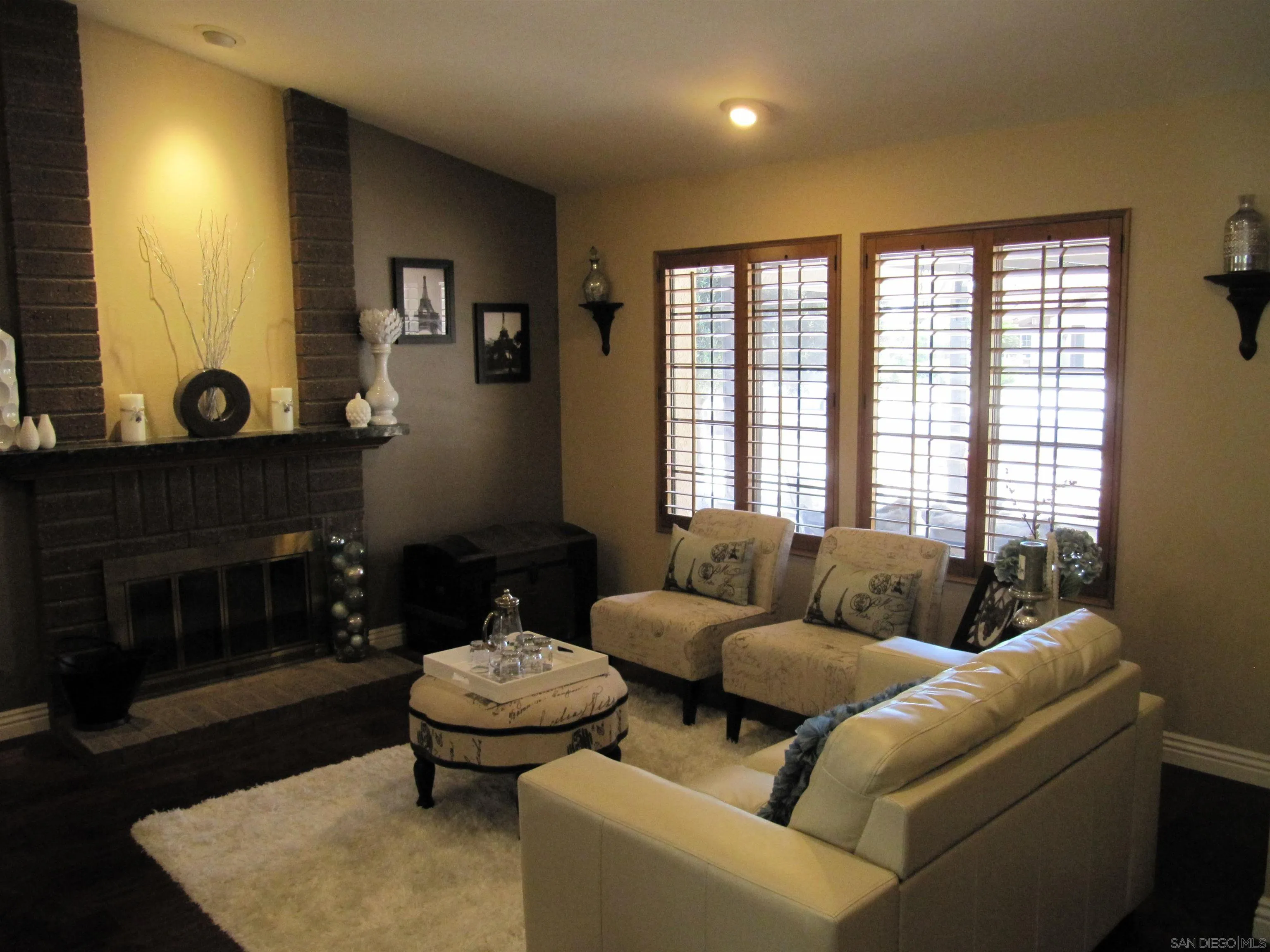 13236 Poway Hills Drive Poway, CA 92064 - Photo 3 of 19 a living room with furniture and a fireplace