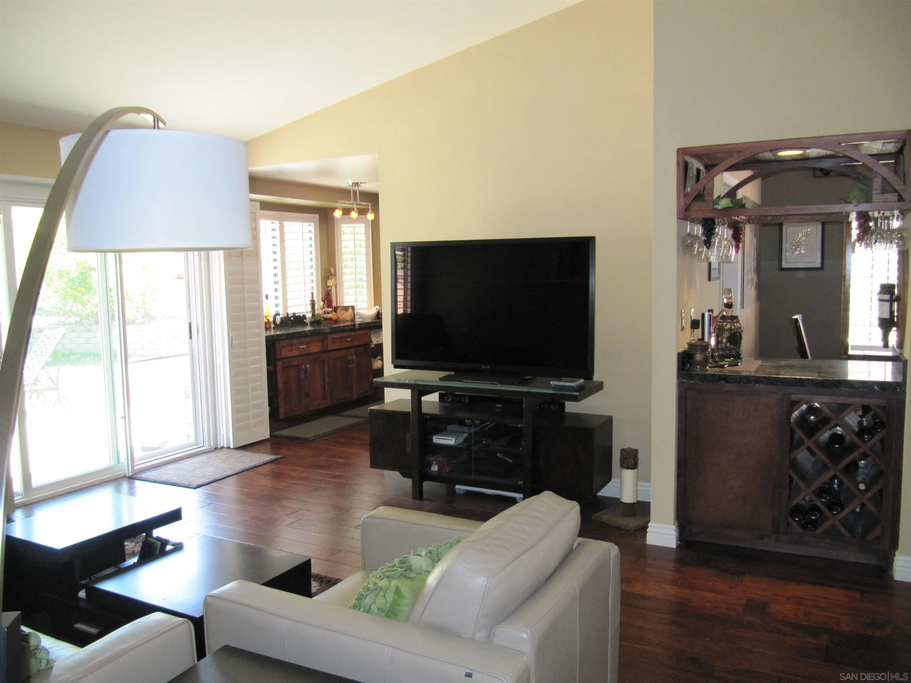 13236 Poway Hills Drive Poway, CA 92064 - Photo 8 of 19 a living room with furniture and a flat screen tv