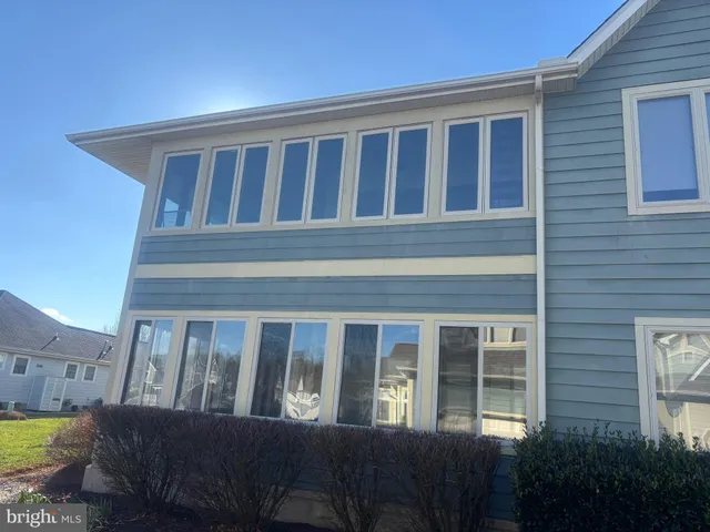 a balcony view with a chair