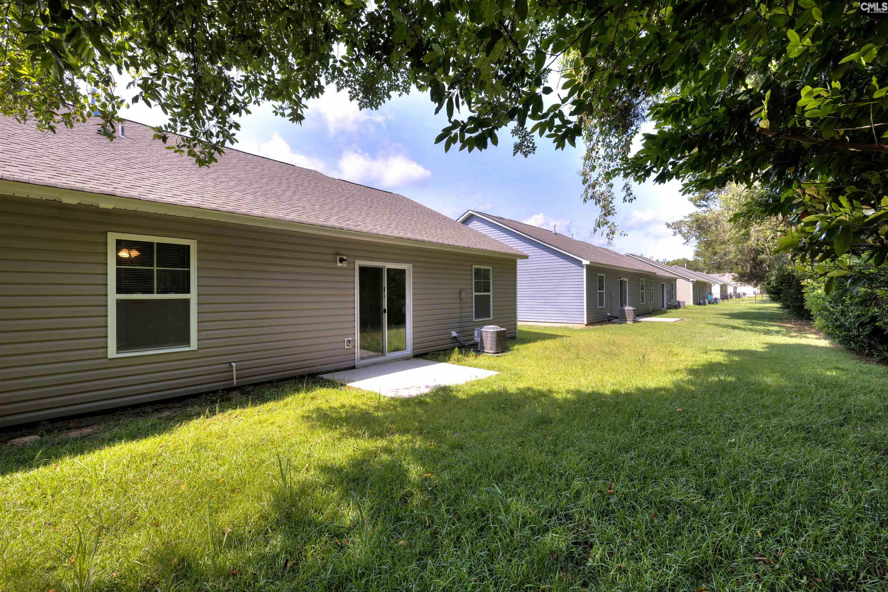 2157 Still Pointe Drive Sumter, SC 29154 - Photo 24 of 25 a front view of house with yard and green space