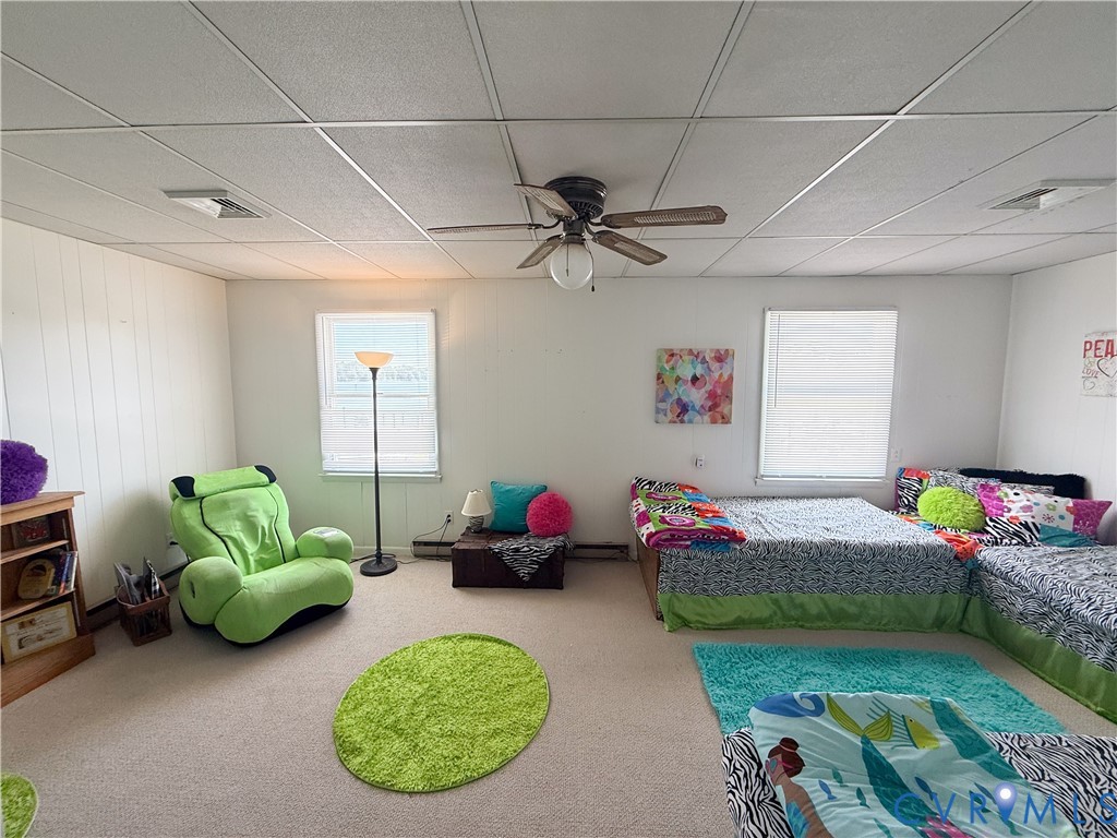 1280 Little Florida Road Farnham, VA 22460 - Photo 23 of 41 Carpeted room featuring two windows, drop ceiling,