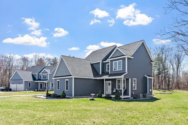 a view of a house with a big yard