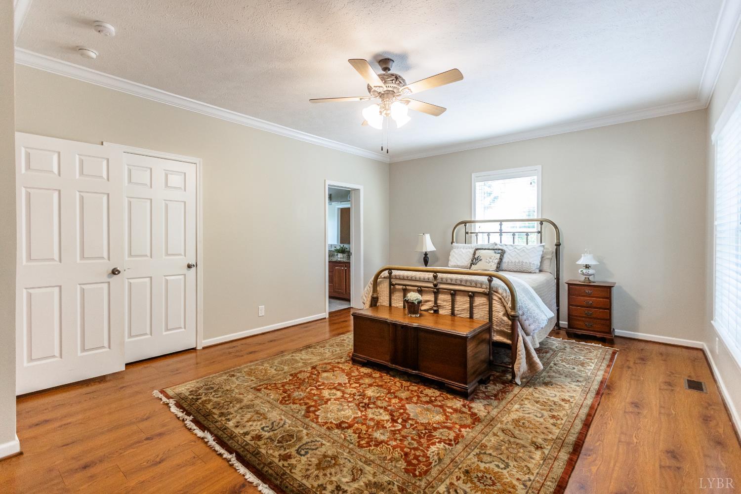 1562 Rocks Church Road Pamplin, VA 23958 - Photo 26 of 30 a bedroom with a bed and wooden floor